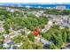 Aerial view of the house in a lush, green neighborhood, showcasing its convenient location at 3001 Wiley Dr., North Myrtle Beach, SC 29582