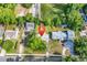 An aerial view of a house surrounded by trees, featuring a lush yard and a sidewalk at 3001 Wiley Dr., North Myrtle Beach, SC 29582