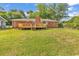 This spacious backyard features a wooden deck and plenty of room to relax and entertain at 3001 Wiley Dr., North Myrtle Beach, SC 29582