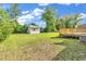 Spacious backyard with a shed and a wooden deck, perfect for outdoor activities at 3001 Wiley Dr., North Myrtle Beach, SC 29582