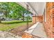 Charming front porch showcasing the brick exterior and well-maintained landscaping of the home at 3001 Wiley Dr., North Myrtle Beach, SC 29582