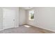 Cozy bedroom with a window allowing for natural light and a door for easy access at 373 Acosta Circle, Conway, SC 29527