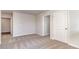 Bedroom view with neutral carpet, showing doorways and light switches, providing a bright, airy feel at 373 Acosta Circle, Conway, SC 29527