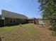 Spacious backyard featuring patio, storage shed, and mature trees at 3805 Mayfield Dr., Conway, SC 29526