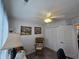 Inviting bedroom with natural light, a ceiling fan, comfortable rocking chair, and closet at 3805 Mayfield Dr., Conway, SC 29526