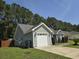 Exterior view of the garage showcasing curb appeal at 3805 Mayfield Dr., Conway, SC 29526