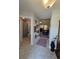 Hallway view, showing the bathroom to the left and living area to the right with light-colored flooring at 3805 Mayfield Dr., Conway, SC 29526