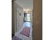 Foyer view featuring access to the front door, a storage closet, and neutral-colored walls at 3805 Mayfield Dr., Conway, SC 29526