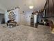 Kitchen featuring dark cabinets, granite countertops, stainless steel appliances, with a view into the living room at 3805 Mayfield Dr., Conway, SC 29526
