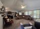 Spacious living room features plush carpet, ample seating, and lots of natural light from the windows at 3805 Mayfield Dr., Conway, SC 29526