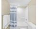 Clean bathroom features a shower and tub combo with striped shower curtain at 3805 S Ocean Blvd. # 503, North Myrtle Beach, SC 29582