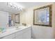Bathroom featuring framed mirror, large vanity with ample storage, and neutral walls at 3805 S Ocean Blvd. # 503, North Myrtle Beach, SC 29582