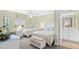 Light and airy bedroom with two beds, a bench, and a connecting bathroom at 3805 S Ocean Blvd. # 503, North Myrtle Beach, SC 29582