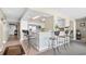 Bright kitchen features a marble breakfast bar with seating for six and modern stainless appliances at 3805 S Ocean Blvd. # 503, North Myrtle Beach, SC 29582