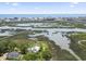 Overhead shot of a house on waterway with distant ocean views at 400 Elizabeth Dr., Murrells Inlet, SC 29576