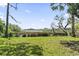 A picturesque backyard featuring lush grass, beautiful trees and view of the waterway at 400 Elizabeth Dr., Murrells Inlet, SC 29576