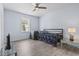Bright bedroom with neutral walls, wood-look floors and a window offering natural light at 400 Elizabeth Dr., Murrells Inlet, SC 29576
