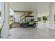 Carport with covered parking and stairs leading to the main living area at 400 Elizabeth Dr., Murrells Inlet, SC 29576