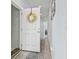 Inviting entryway with a wreath on the front door and a view into the home's interior at 400 Elizabeth Dr., Murrells Inlet, SC 29576