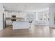 Well-lit kitchen features a kitchen island with bar stool seating and modern lighting fixtures at 400 Elizabeth Dr., Murrells Inlet, SC 29576