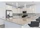 Open concept kitchen featuring granite countertops, a tile backsplash, and stainless steel appliances at 400 Elizabeth Dr., Murrells Inlet, SC 29576