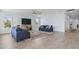 Bright living room featuring ample natural light, two sofas, and a neutral rug at 400 Elizabeth Dr., Murrells Inlet, SC 29576