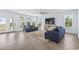 Bright living room featuring ample natural light, two sofas, and a neutral rug at 400 Elizabeth Dr., Murrells Inlet, SC 29576