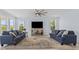 Bright living room featuring ample natural light, two sofas, and a neutral rug at 400 Elizabeth Dr., Murrells Inlet, SC 29576