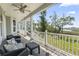 Cozy porch with comfortable seating, offering serene views of the surrounding landscape and waterway at 400 Elizabeth Dr., Murrells Inlet, SC 29576
