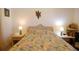 Comfortable bedroom showcasing paisley bedding, side tables with lamps, and a cozy atmosphere at 400 Lands End Blvd. # 5304, Myrtle Beach, SC 29572