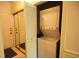 Convenient laundry closet with stacked washer and dryer adjacent to mirrored closet doors at 400 Lands End Blvd. # 5304, Myrtle Beach, SC 29572
