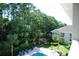 Overhead view of a refreshing pool surrounded by lush greenery and lounge chairs next to the building at 400 Lands End Blvd. # 5304, Myrtle Beach, SC 29572