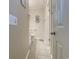 Small bathroom includes a toilet, vanity, tile flooring and updated lighting at 415 Ocean Creek Dr. # 2189, Myrtle Beach, SC 29572