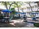 Charming courtyard featuring inviting seating areas, stone fountain, and serene landscaping at 415 Ocean Creek Dr. # 2189, Myrtle Beach, SC 29572