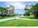 Open green space with walking paths between condo buildings at 415 Ocean Creek Dr. # 2189, Myrtle Beach, SC 29572