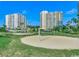 A scenic volleyball court sits in front of condos at 415 Ocean Creek Dr. # 2189, Myrtle Beach, SC 29572