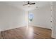 Bedroom featuring neutral walls, hardwood flooring, and a single window at 434 Harbour View Dr., Myrtle Beach, SC 29579
