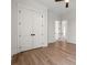 Bedroom with walk-in closet, wood floor, and neutral-colored walls at 434 Harbour View Dr., Myrtle Beach, SC 29579