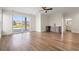Bright living room featuring sliding glass doors, wood flooring and wet bar at 434 Harbour View Dr., Myrtle Beach, SC 29579
