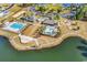 Community amenities include a pool, cabana, and playground surrounded by a lake at 4548 Marshwood Dr., Myrtle Beach, SC 29579