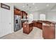 Kitchen with stainless steel appliances, island, brown cabinets and breakfast bar at 4548 Marshwood Dr., Myrtle Beach, SC 29579