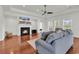 Inviting living room featuring a fireplace, hardwood floors, and comfortable seating at 4548 Marshwood Dr., Myrtle Beach, SC 29579