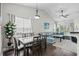 Open concept dining area with view to living room with lots of natural light at 4933 Crab Pond Ct. # 201, Myrtle Beach, SC 29579