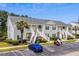 Inviting two-story condo with landscaped grounds and convenient parking at 4933 Crab Pond Ct. # 201, Myrtle Beach, SC 29579