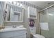 Nautical bathroom features charming decor, vanity, and a glass-enclosed shower at 500 23Rd Ave. S, North Myrtle Beach, SC 29582