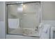 Clean bathroom showcasing a tub and shower, a sliding glass door, and neutral fixtures at 500 23Rd Ave. S, North Myrtle Beach, SC 29582