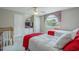 Bedroom features a television, ceiling fan, and two twin beds for optimal space and comfort at 500 23Rd Ave. S, North Myrtle Beach, SC 29582