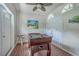 Game room features a foosball table, ceiling fan, and beautiful terra cotta tile floors at 500 23Rd Ave. S, North Myrtle Beach, SC 29582