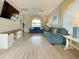 Cozy living room with plush sofas, bright interiors, and modern entertainment center at 500 23Rd Ave. S, North Myrtle Beach, SC 29582