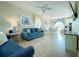 Spacious living room with comfortable seating, bright interiors, and modern entertainment center at 500 23Rd Ave. S, North Myrtle Beach, SC 29582